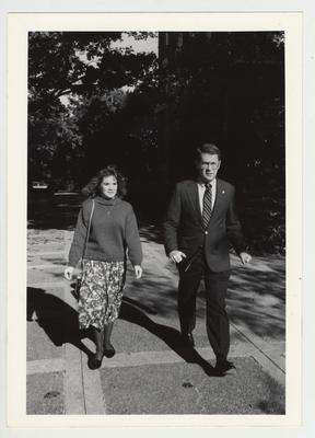President Roselle (right) is walking on campus with an unidentified woman