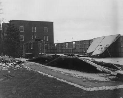 The temporary barracks that had been used are being torn down for the construction of Holmes Hall to begin