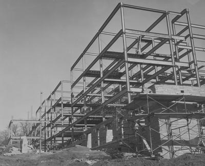 Construction of Holmes Hall began on June 27, 1956, a woman's dormitory which was named after Sarah B. Holmes and dedicated on May 25, 1958. Received March 18, 1957 from Public Relations