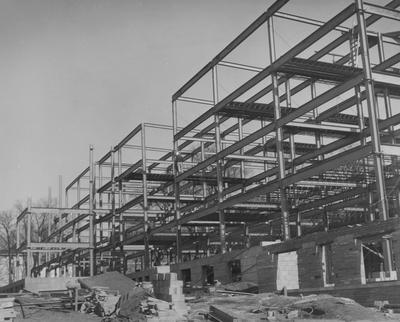 Construction of Holmes Hall began on June 27, 1956, a woman's dormitory which was named after Sarah B. Holmes and dedicated on May 25, 1958. Received March 18, 1957 from Public Relations