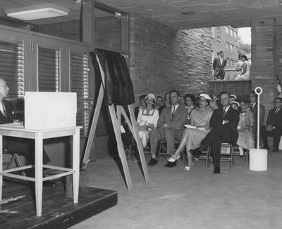 The Sarah Holmes family, listening to the dedication of Holmes Hall on May 25, 1958. Received May 25, 1958 from Public Relations