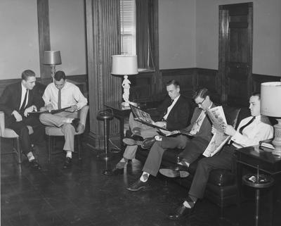 Five unidentified men are reading in Keeneland Hall, a woman's dorm. Keeneland Hall was named after the Keeneland Foundation which donated $200,000 and on October 17, 1955, it was dedicated to the foundation