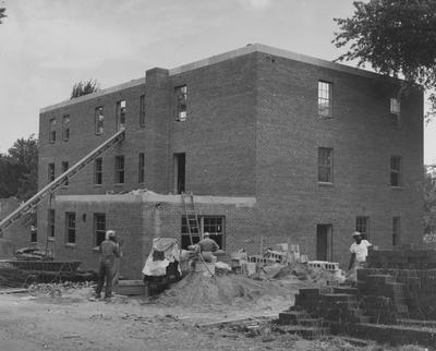 Construction of the Delta Zeta house and sorority row. Received August 9, 1957 from Public Relations