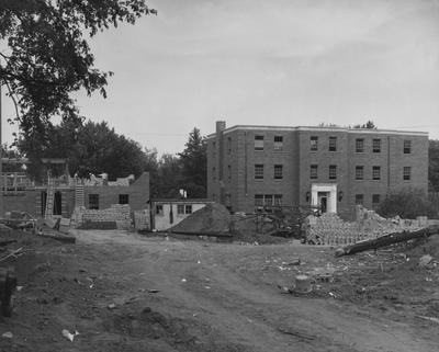 The Kappa Delta house and the Alpha Gamma Delta house of sorority row are under construction. Received August 9, 1957 from Public Relations
