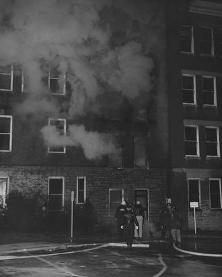 Firefighters battling 1956 blaze at Frazee Hall. Frazee Hall was built in 1907 and named after David Frances Frazee on June 3, 1931. Photographer: University of Kentucky
