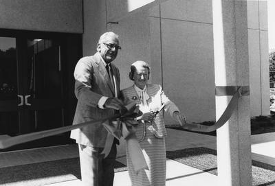 Mrs. Maxwell H. Gluck and UK President Otis A. Singletary, cut the ribbon to open the Maxwell H. Gluck Equine Research Center