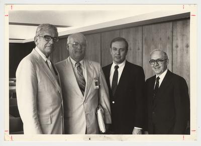 President Singletary standing with three Chancellors.  From the left:  President Singletary; Peter Bosomworth, Chancellor of Medical Center; Dr. Charles Wethington; Chancellor of Community Colleges; and Art Gallaher, Lexington Campus Chancellor