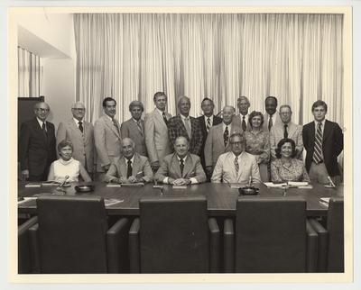 President Singletary (sitting, second from the right) with the Board of Trustees.  The Board of Trustees members are unidentified