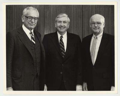 President Singletary is standing with two men.  From the left:  President Singletary, Dr. A Byron Young, and Dr. Peter Bosomworth