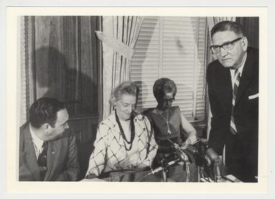 Elizabeth (Betty) Kirwan (second from left) attends the board meeting where her husband, A. D. 
