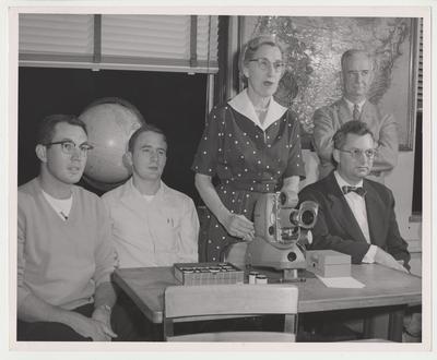 Five unidentified people in Miss Shipman's Rapid Reading class, part of the University Extension Program.  This is the audio-visual of Miss Shipman's Rapid Reading class.  University Extension was the forerunner to distance learning
