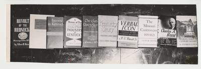 A photograph of books that were printed by the University Press of Kentucky