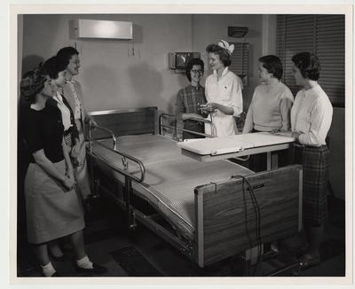 Members of the College of Nursing learn to use an adjustable bed