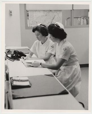 Two unidentified female nursing students are studying