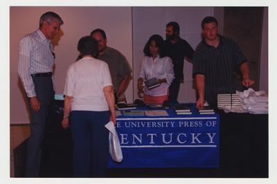 A University Press of Kentucky table is selling the book 