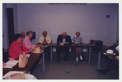 Mary Wilma Hargreaves (far right), Jerry Crouch (second from right), Robert Sexton (third from right), Dr. Thomas Clark (center), Nancy Baird (second from left), and Carol Crowe Carrico (left) are seated at a table at Dr. Thomas D. Clark's 100th birthday celebration at Young Library