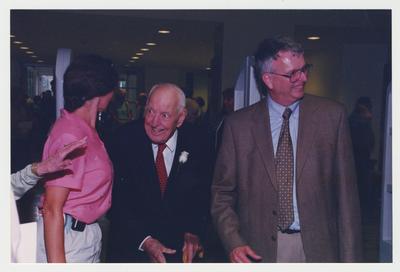 Thomas D. Clark (left) and William J. Marshall, Director of Special Collections and Archives (right) are entering Young Library for Thomas Clark's 100th birthday celebration
