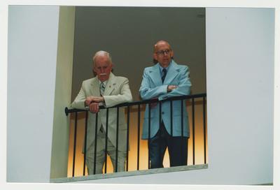 Joe Houlihan (left) and an unidentified man (right) are watching Dr. Thomas D. Clark's 100th birthday celebration at Young Library