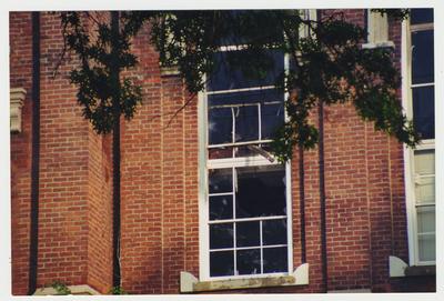 A close up of a window in the Administration / Main Building during the fire