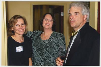 Eeva Hoch (left); Sharon Turner (center), Dean of Dentistry; and an unidentified man are at a ceremony for the reopening of the Main Building