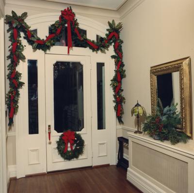 The door inside Maxwell Place is decorated for Christmas, while President Roselle was the resident