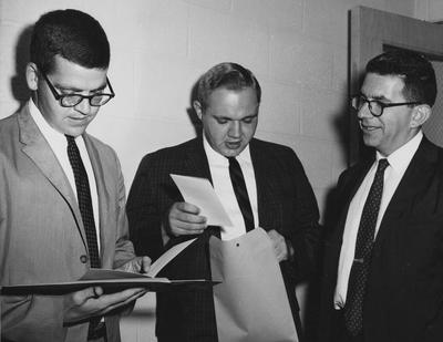 Three unidentified men. Received September of 1960 from Public Relations