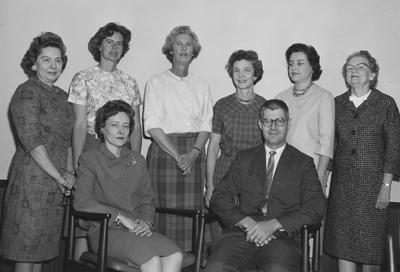 Mrs. Herbert Riley (right), Mrs. James A. Lollis (third from right), and Mrs. Bobby Rauanourgh (front left). Received May 2, 1963 from Public Relations