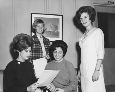 From left to right: Mrs. Bette Corum, Mrs. Judi Pulito, Miss Sissy Leachman, and Mrs. Sonja Kabzinski; all guides at the UK Medical Center. Received February 26, 1965 from Public Relations