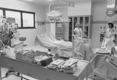 Two unidentified women are standing in the operating room in the Critical Care Center of the UK Medical Center