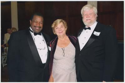 From the left:  Everett McCorvey (School of Music), Wendy Baldwin (executive Vice President for Research), and Del Lutrell.  They are at a ceremony for the reopening of the Main Building