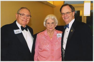 From the left:  Warren Rosenthal, Betty Rosenthal, and President Lee Todd.  They are at a ceremony for the reopening of the Main Building