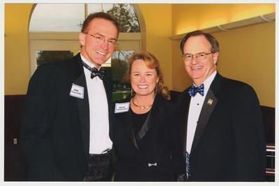 From the left:  John C. Schenkenfelder, Karen Schenkenfelder, and President Lee Todd.  They are at a ceremony for the reopening of the Main Building