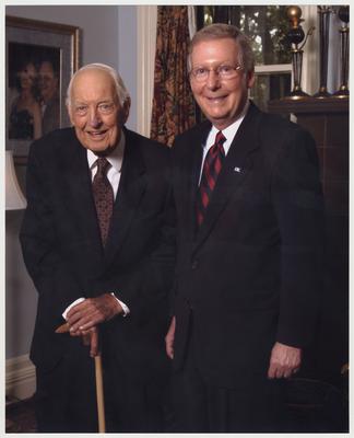 US Senator Mitch McConnell (College of Law Alumnus) and State Historian Laureatte Thomas D. Clark are standing together.  This photograph was take in Maxwell Place as part of the festivities for the dedication of the Mitch McConnell Room in the College of Law