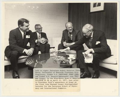 From the left:  Patterson School Director Vince Davis, UK President Otis Singletary, former US President Gerald Ford, and former US Senator / Ambassador John Sherman Cooper are seated around a table.  The picture was taken prior to Ford's lecture for the Patterson School of Diplomacy and International Commerce