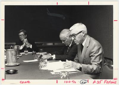 From the left: Two unidentified men and Carl Cone are seated around a table to discuss the Thomas D. Clark endowment