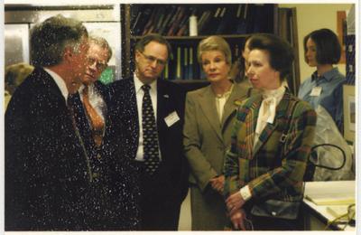 A group of people in a laboratory in the Maxwell H. Gluck Equine Research Center.  From the left: two unidentified men; UK President Lee Todd; Alice Chandler; the Princess Royal Anne of Great Britain; and an unidentified woman