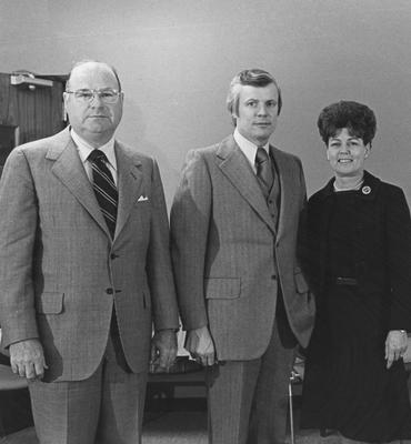 John Y, Brown Jr. was on the UK campus prior to his candidacy for the Kentucky governor ship, to dedicate the Sanders- Brown Research Center on Aging building. On his right is William Sturgill, then chairman of the UK Board of Trustees, and on his left, Mrs. Otis Singletary, wife of the UK president
