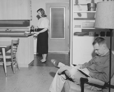 Ben Johnson (right) and his wife at their apartment at Shawneetown. Received March 31, 1958 from Public Relations