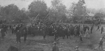 An unidentified crowd of people on Stoll Field after a football game