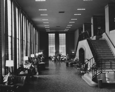 People socializing; interior of Student Union before remodeling. Received April 2, 1957 from Public Relations