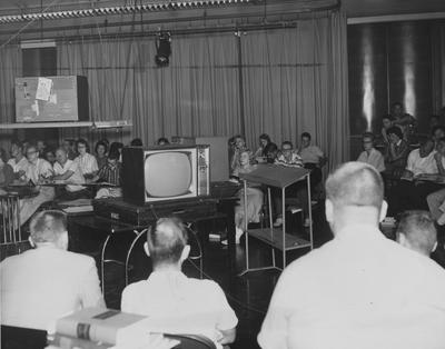 Students watching television in class. Received October 8, 1959 from Public Relations. University of Kentucky Photograph