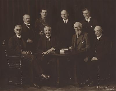 British Universities Mission--Front row: Professor John July- Dubln University, Sir Henry Jones-Professor of Philosophy, Glasgow University, Professor Mewburn Walker-Oxford University. Standing: Sir Henry Meirs- Vice Chancellor-Manchester University, Lt. Nichols , Secretary to Mr. Shipley. President D. J. Cowling-Cainleton College, and Professor Thayer- Harvard University. Photo by Underwood and Underwood. Received January of 1953 from Dr. McVey's files
