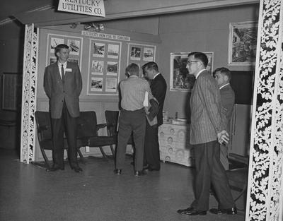 Men looking at the Kentucky Utilities Company at the 1960 Career Carnival. Received November 1, 1960 from Public Relations