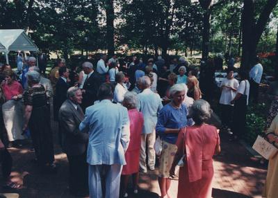 Celebration: July 11, 2002; Actual Birthday: July 16, 2002. Man with blue jacket and back to the camera is John Irvine. Mrs. John Gaines (Joan) is speaking to Eleanor Milward, who has her back to the camera. President Todd is talking with Bob Milward. And the woman wearing an orange jacket is Terry Green, Director of Ashland Home Trust