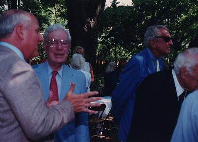 Celebration: July 11, 2002; Actual Birthday: July 14, 1903. Left to right: unidentified person, former UK Presidents Frank Dickey (red tie) and Otis Singletary in sunglasses. Dr. Clark is to the far right