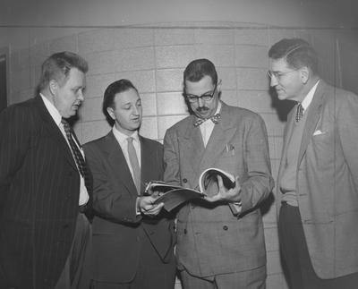 From left to right: Aimo Kiviniemi, Music Department; Leonard Press, radio arts; Dr. William H. Jansen, Department of English; Dr. Abe Kirwan