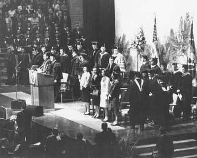 Centennial Founders Day Convocation (February 22, 1965) platform party. Featured speaker was President of the United States, Lyndon B. Johnson (far left on platform, head bowed). At podium is Kentucky Governor Edward T. Breathitt. To his right stands University of Kentucky President, John W. Oswald