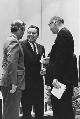 President A. D. Kirwan (right); Elvis J. Stahr Jr. (center), Dean of the Law School; and an unidentified man (left) are conversing with each other at Founders Day. Elvis J. Stahr Jr. spoke. This photo appears first on page 97 in the 1969 