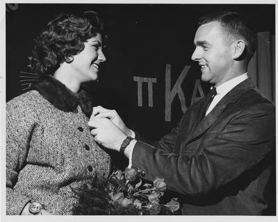 Art Miller, president, honors Mary Florence, Kappa Kappa Gamma Sorority, who was selected as the Pi Kappa Alpha fraternity's national Dream Girl in Miami Beach, Florida, this summer
