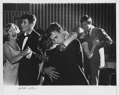 Couples dancing at a fraternity party. This photo appears first on page 309 in the 1969 Kentuckian